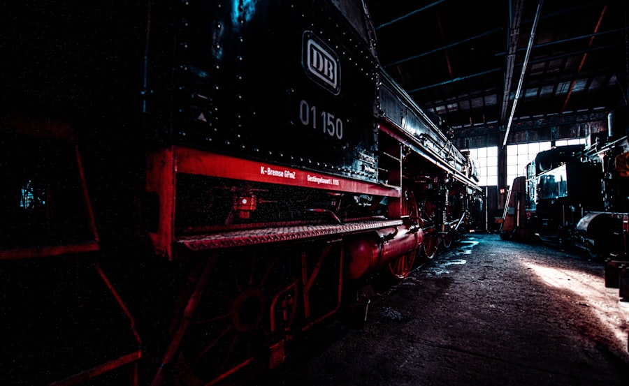 a train sitting in a train station next to another train