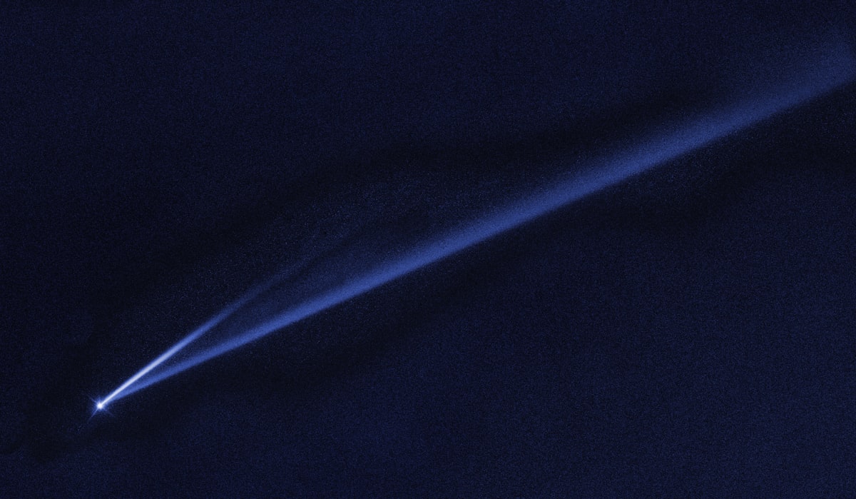 a light emitting from the top of a dark object