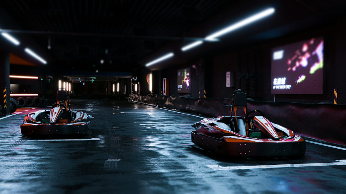 two go kart racing cars in a dark tunnel