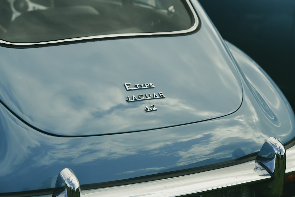Close-up of a classic light blue jaguar e-type rear
