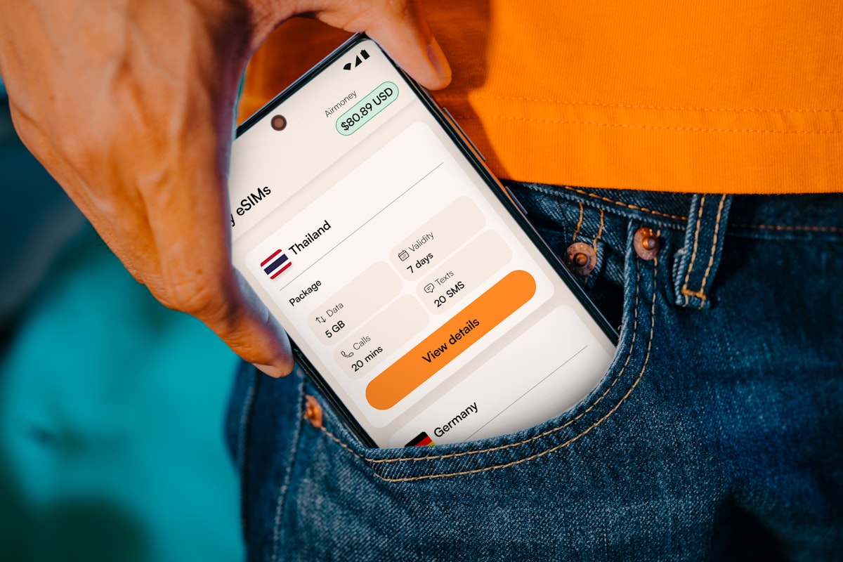 Smartphone displaying travel information in a pocket
