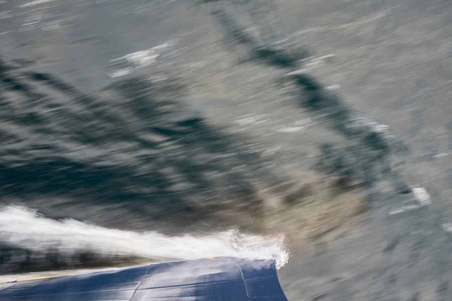 A man riding a wave on top of a surfboard