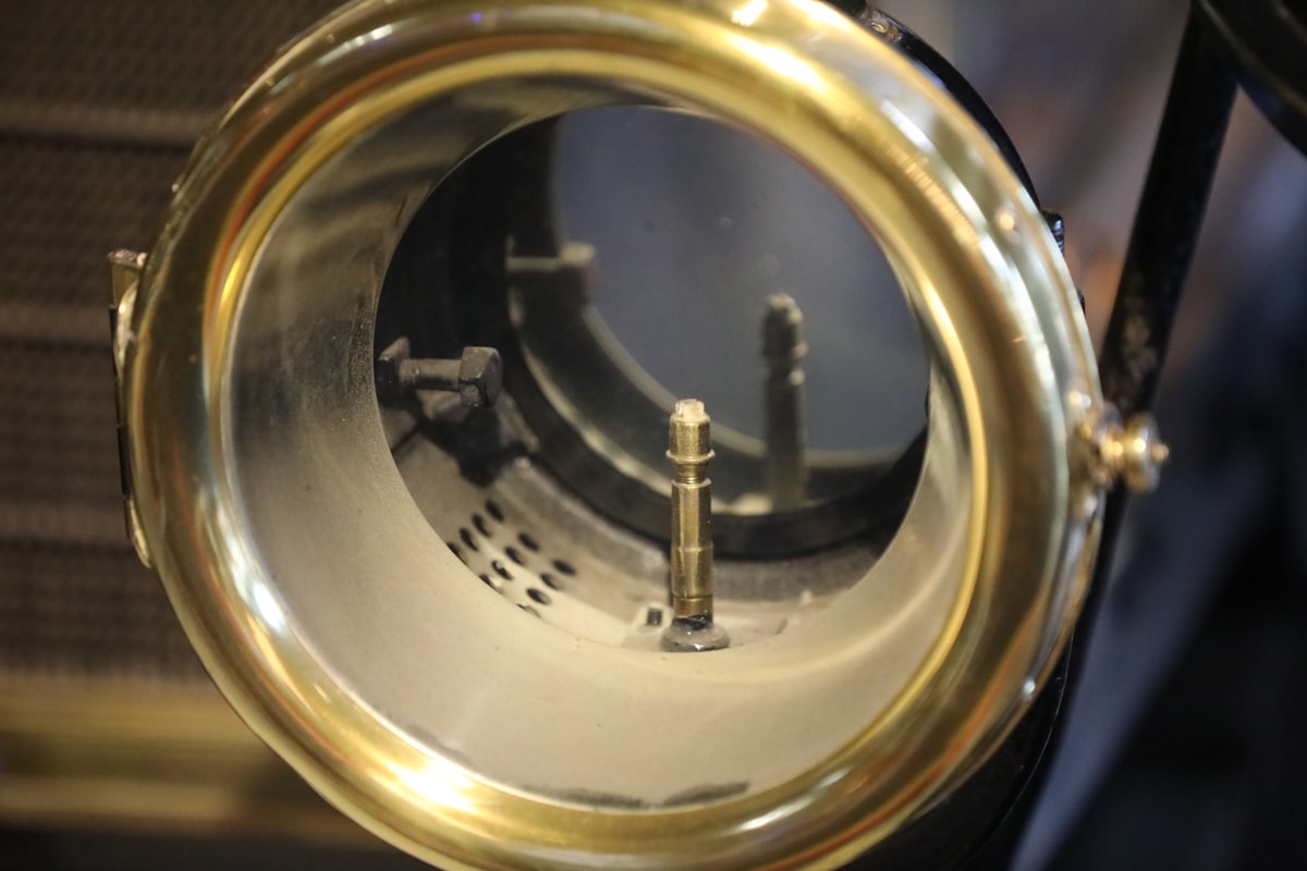 a close up of a metal object with a hole in it