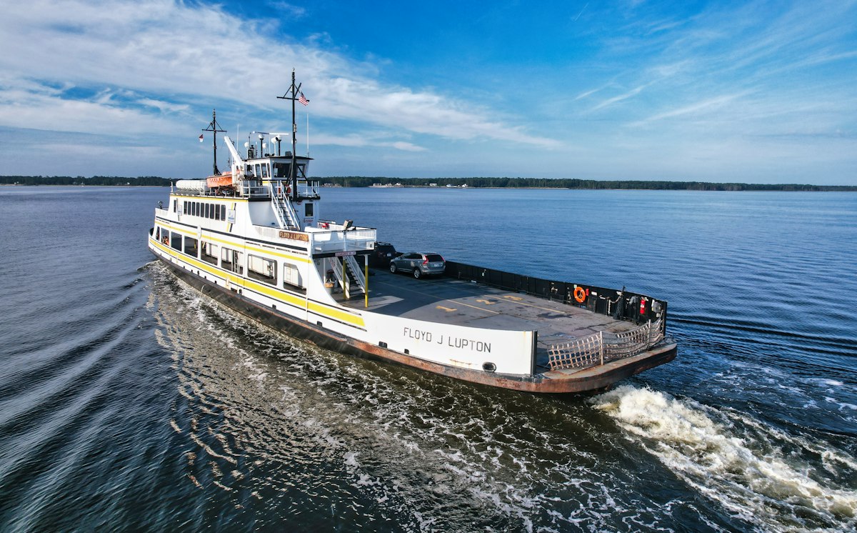 a large boat traveling across a large body of water