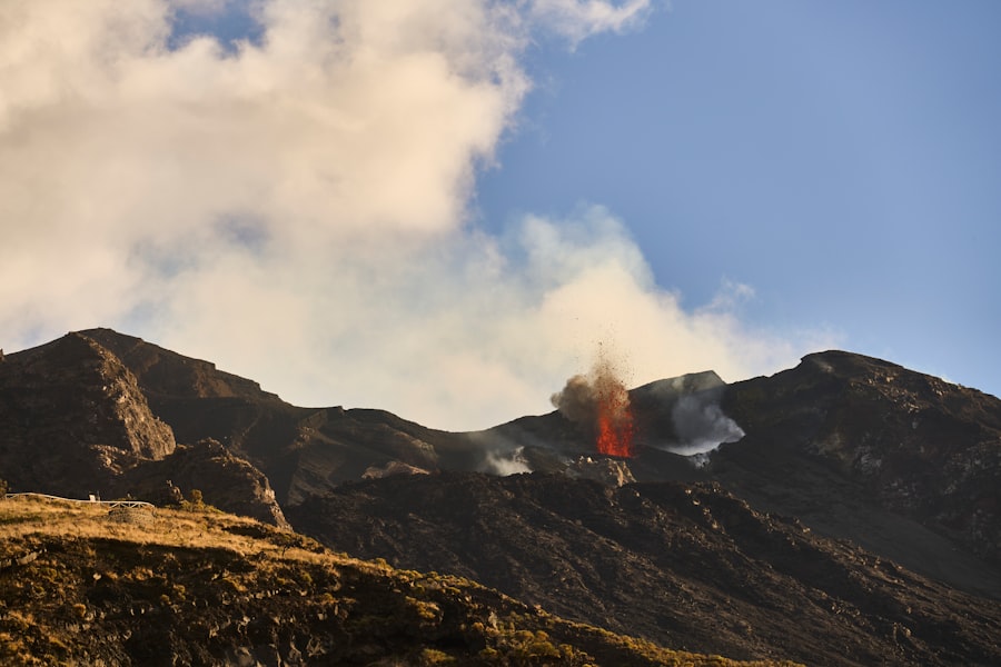 Volcanic eruption with smoke and lava flow.