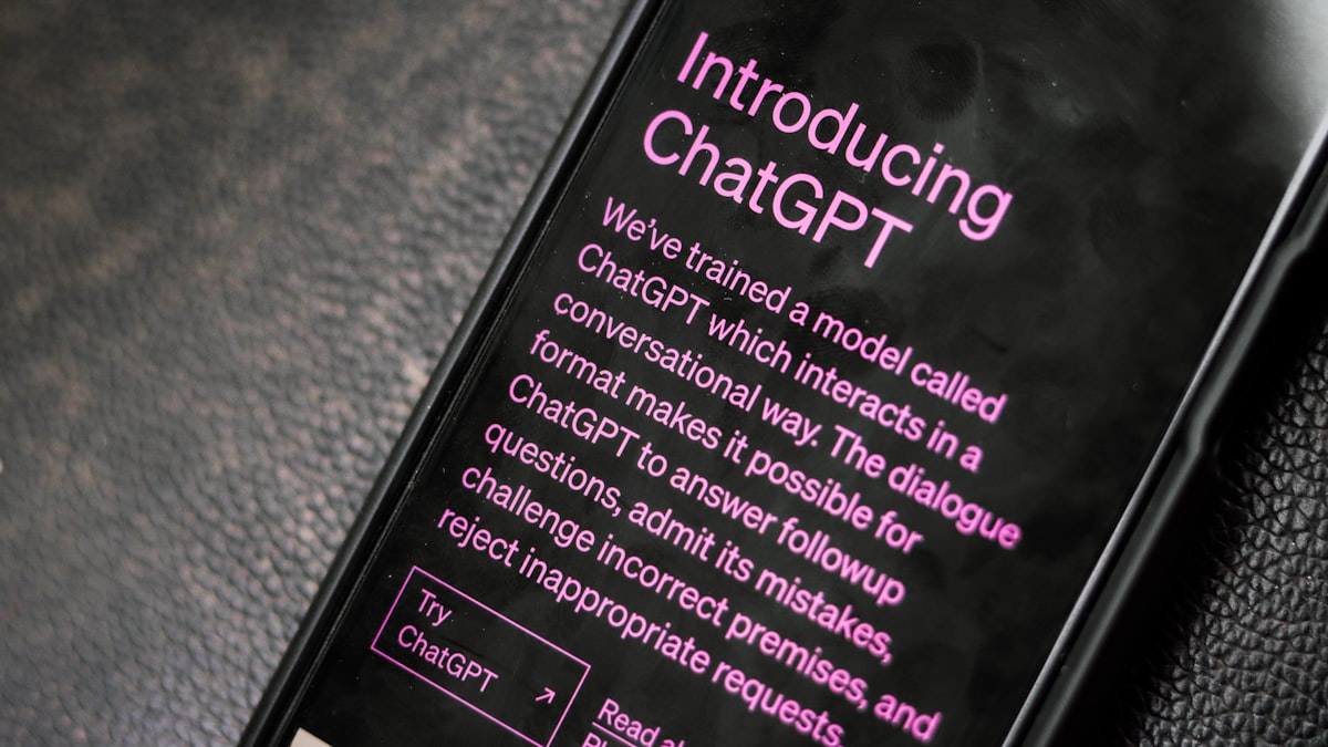 a close up of a cell phone on a table