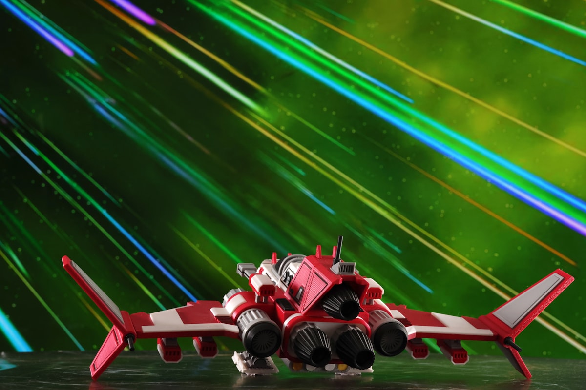 Red and white futuristic spaceship with engines