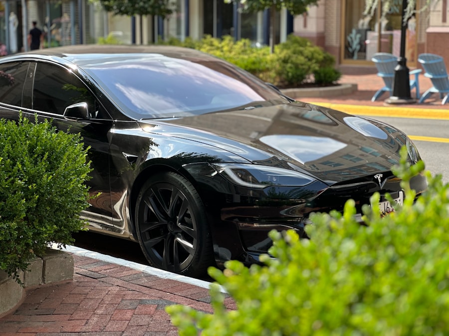A black car parked on the side of the road