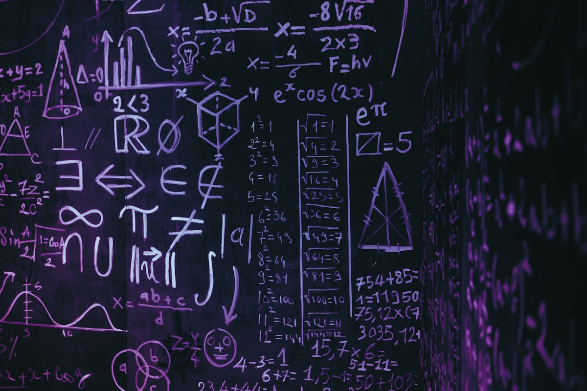 Blackboard with complex mathematical formulas and symbols