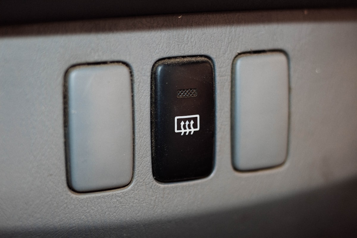 a close up of a button on a car