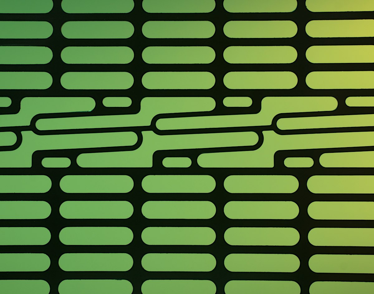 green and black striped textile