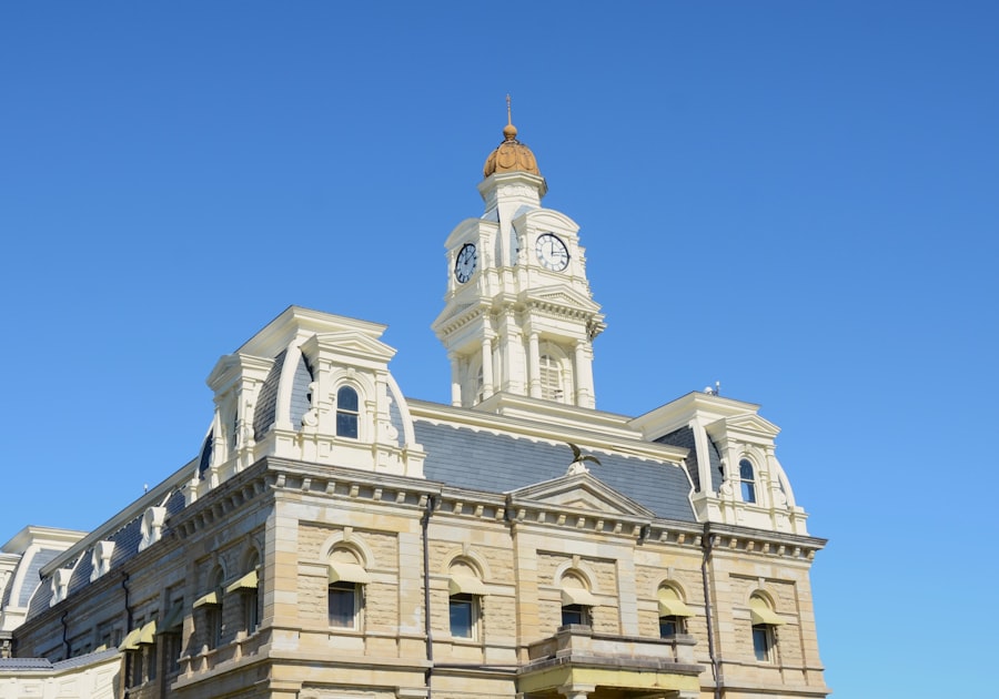 Historic building with a clock tower against blue sky