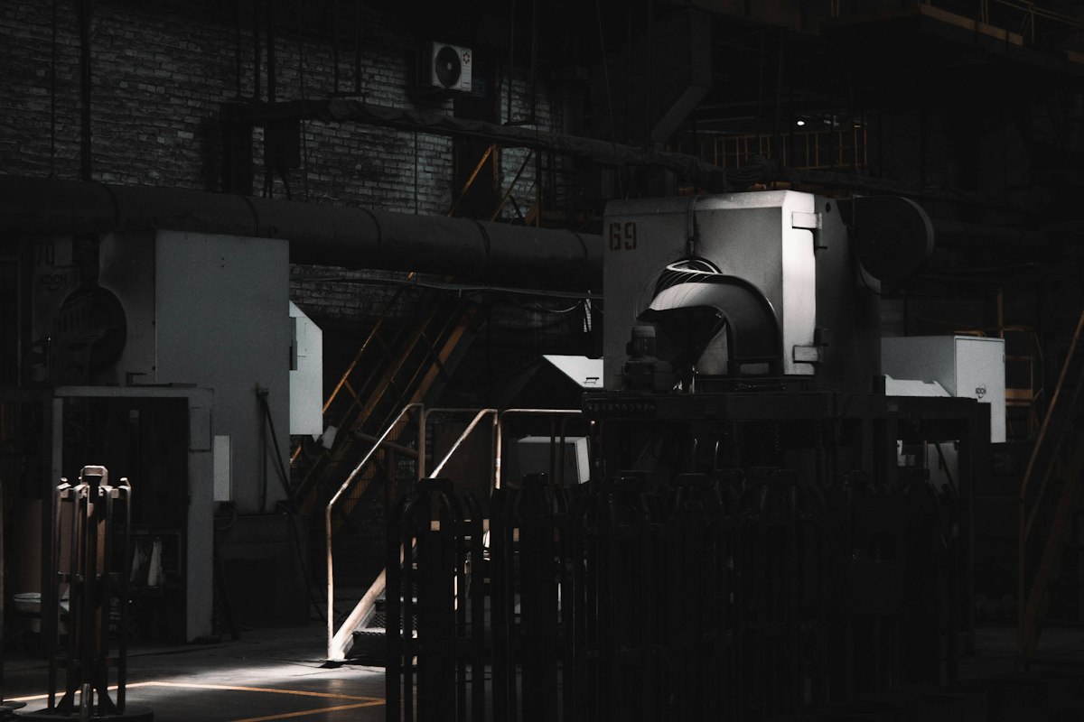 A dark room with a large machine in it