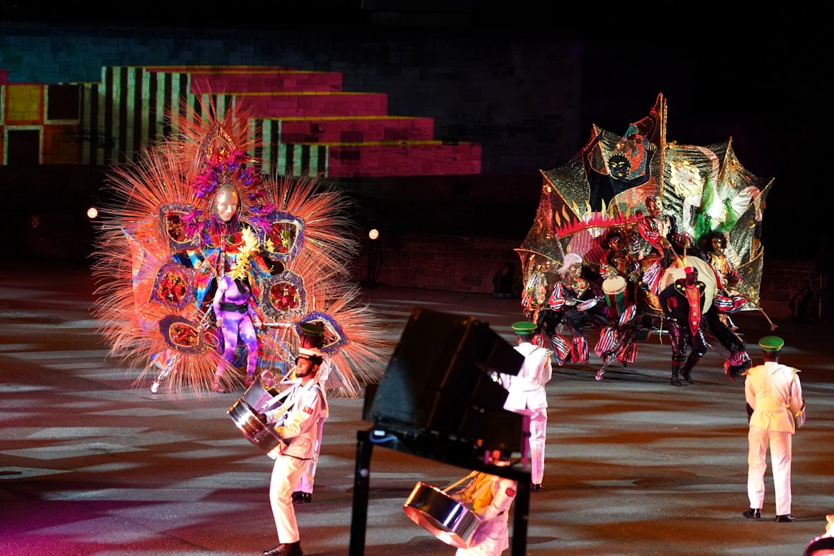a group of people standing on top of a stage