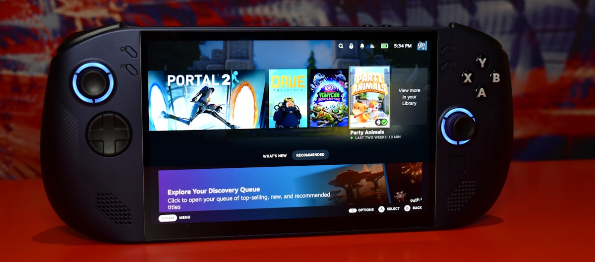 Handheld gaming device displaying game library