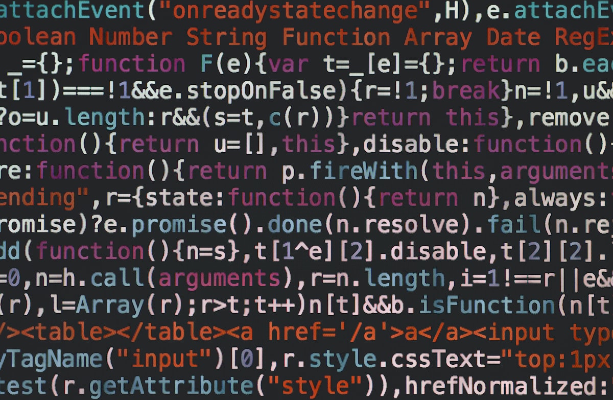 Lines of colorful JavaScript code displayed on a dark screen