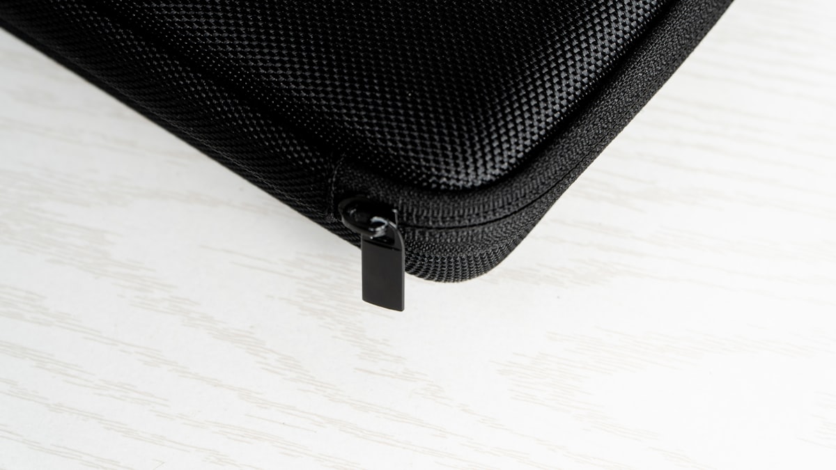 a black case sitting on top of a white table