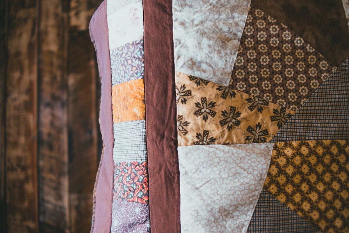 white blue and brown textile