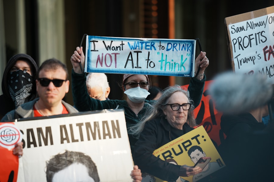 Protesters hold signs at a demonstration