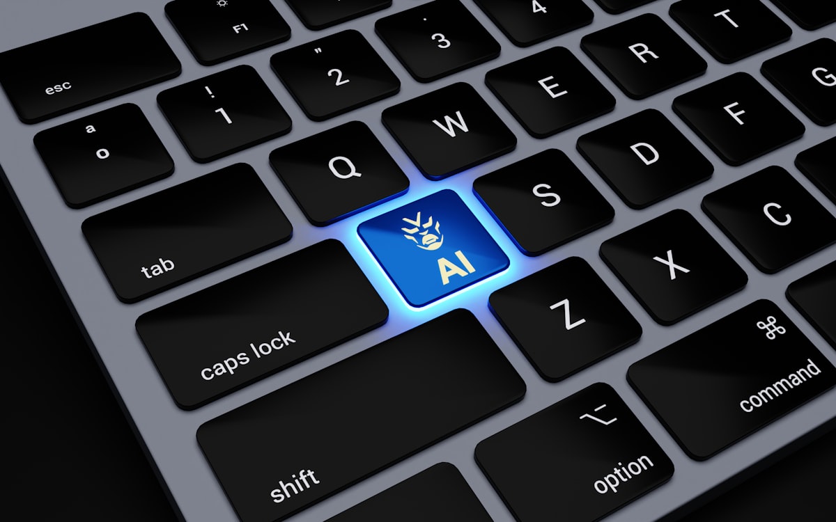 A glowing blue key labeled AI on a black computer keyboard