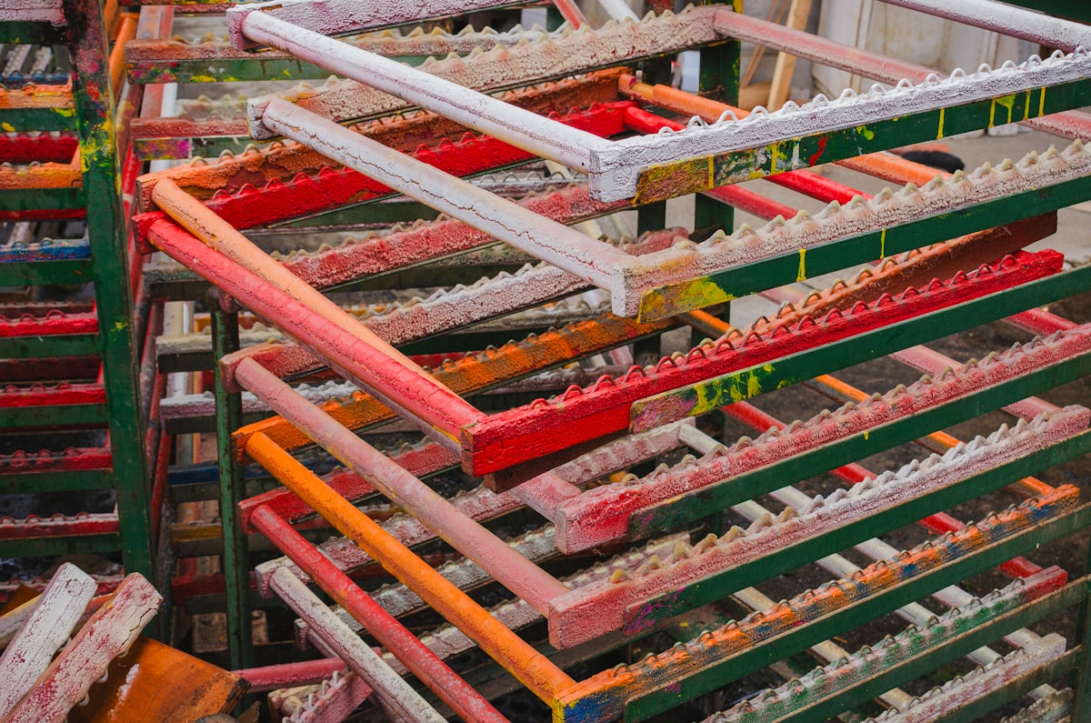 Colorful wooden frames stacked on shelves